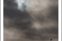 The eclipse on May 20, 2012 as viewed from Los Angeles County beaches. The cloudy marine layer made an interesting natural filter of the sun.