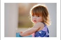 Los Angeles girl gives a sweet expression to a photographer.